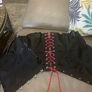 Black mesh corset with red lacing